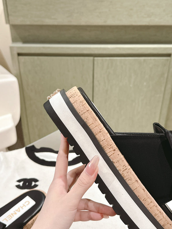 CC SLIPPERS WITH SILK BOW IN BLACK COWHIDE