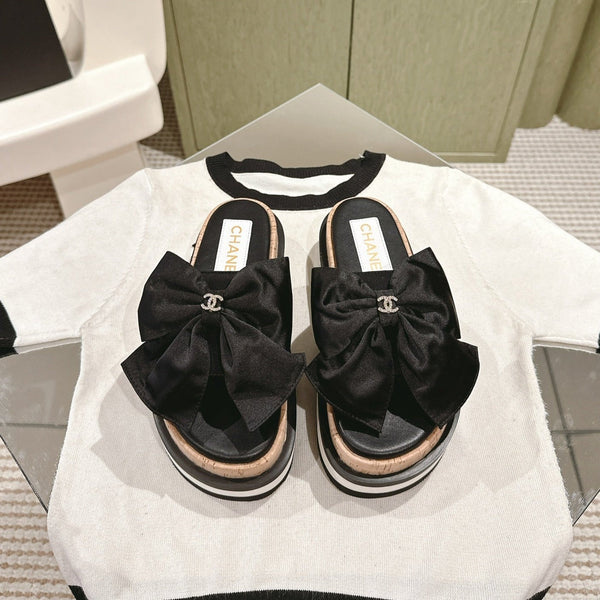 CC SLIPPERS WITH SILK BOW IN BLACK COWHIDE