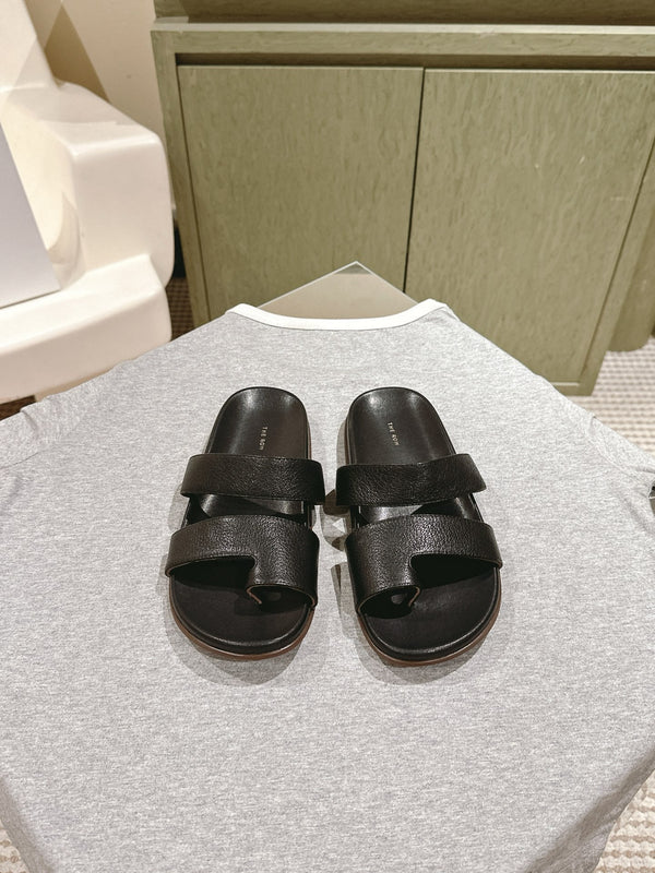 The Row Hugh Slides Black Cowhide Rubber 451281