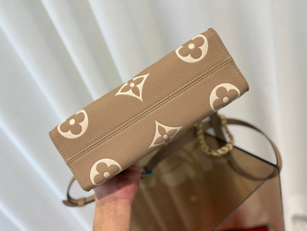 onthego 25 east west da bicolor monogram empreinte