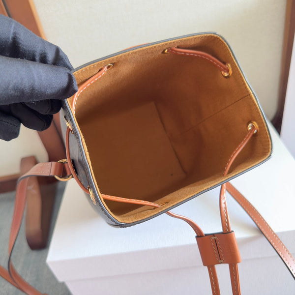 MICRO SAILOR 17 IN BLACK TRIOMPHE CANVAS AND BROWN CALFSKIN TRIM