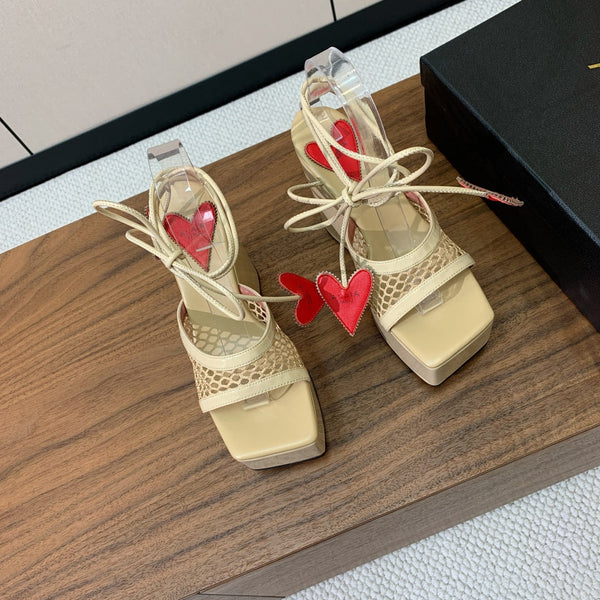 ALAIA BANQUET WEDGE SANDALS IN GOLD LAMBSKIN WITH RED HEART
