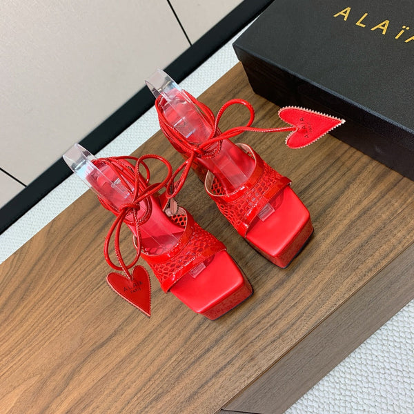 ALAIA BANQUET WEDGE SANDALS IN CHERRY RED LAMBSKIN WITH RED HEART