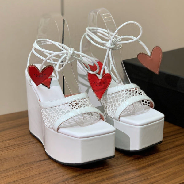 ALAIA BANQUET WEDGE SANDALS IN WHITE LAMBSKIN WITH RED HEART