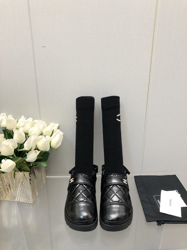 PANTOFOLA CON PLATEAU IN PELLE DI AGNELLO NERA