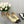 CAMELLIA CAP JANE SANDALS IN GOLD MIX BLACK LAMBSKIN