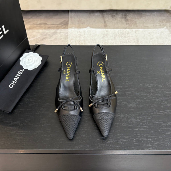 DÉCOLLETÉ CON TACCO ALTO 65 MM IN PELLE DI AGNELLO NERA CON MOTIVO SERPENTE