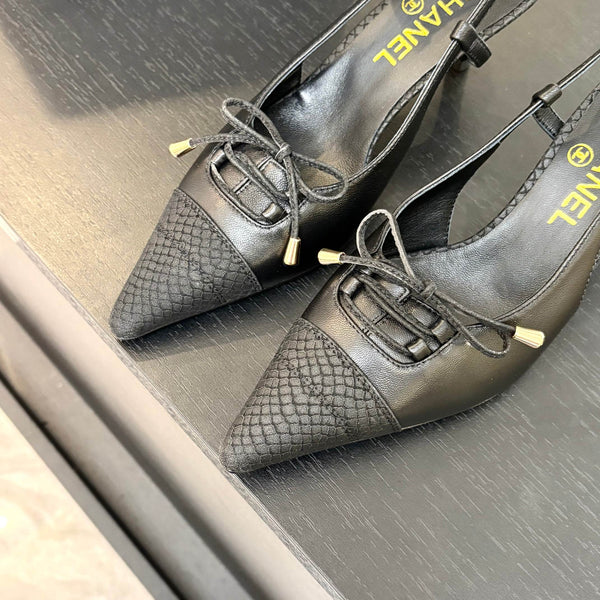 DÉCOLLETÉ CON TACCO ALTO 65 MM IN PELLE DI AGNELLO NERA CON MOTIVO SERPENTE