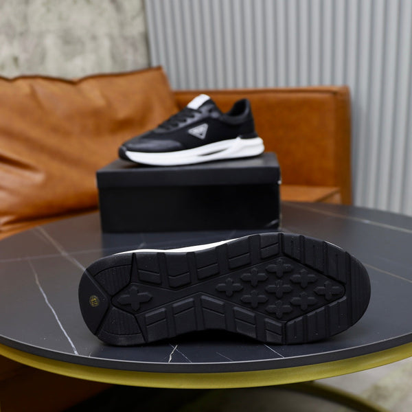 PRA SNEAKER IN BLACK CALFSKIN AND MESH FABRIC