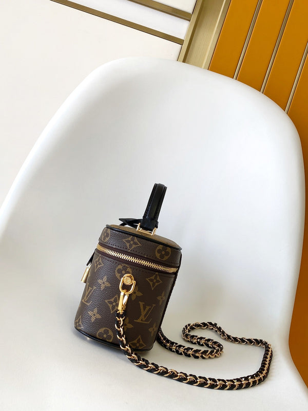 LV M47128 Vanity PM 13 cm con catena in tela monogramma marrone e pelle di caftano GHW