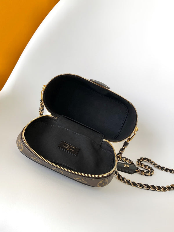 LV M47128 Vanity PM 13 cm con catena in tela monogramma marrone e pelle di caftano GHW