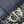 MONTAIGNE EAST-WEST 21 BAG WITH CHAIN IN NAVY BLUE LAMBSKIN AND MONOGRAM JACQUARD