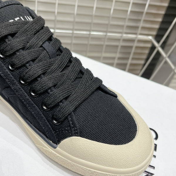 JANE SNEAKERS LOW LACE-UP WITH TRIOMPHE PATCH IN CANVAS AND CALFSKIN BLACK