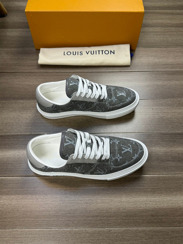 LV TRAINER SNEAKER IN ASH GREY MONOGRAM DENIM