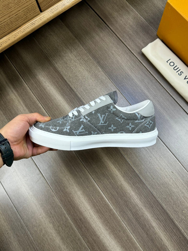 LV TRAINER SNEAKER IN ASH GREY MONOGRAM DENIM