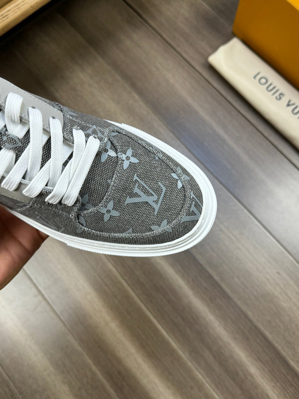 LV TRAINER SNEAKER IN GREY PASTEL MONOGRAM DENIM