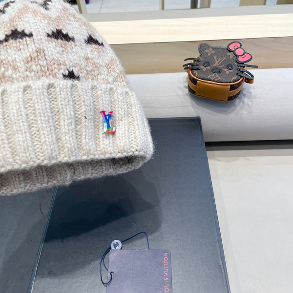 CAPPELLO ANTIVENTO IN LANA COLORATO 406925 