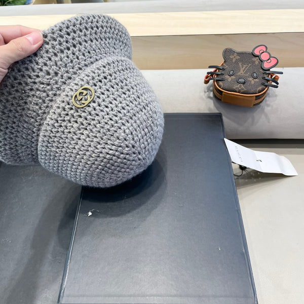 CAPPELLO A SECCHIELLO IN MAGLIA DI LANA GRIGIO ACCIAIO 413396