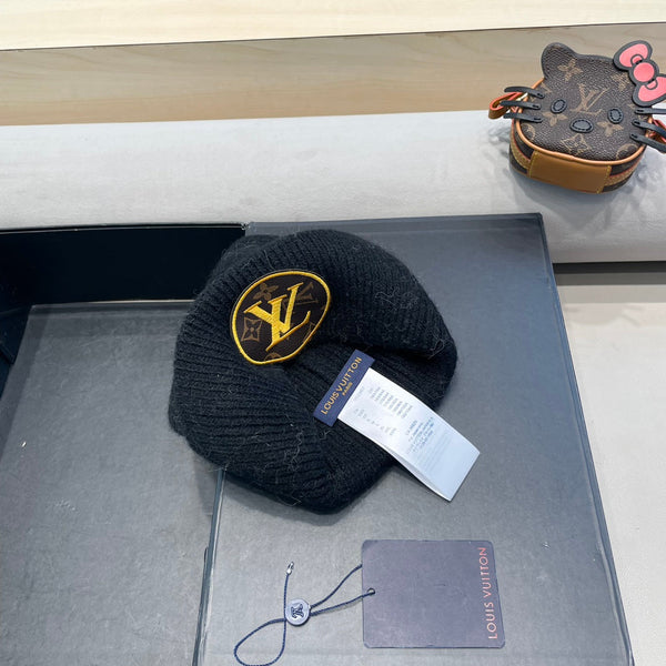 BERRETTO IN MAGLIA DI LANA NERA E PELLICCIA DI CONIGLIO 417754 