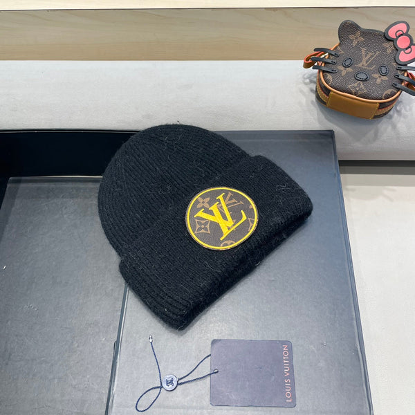 BERRETTO IN MAGLIA DI LANA NERA E PELLICCIA DI CONIGLIO 417754 