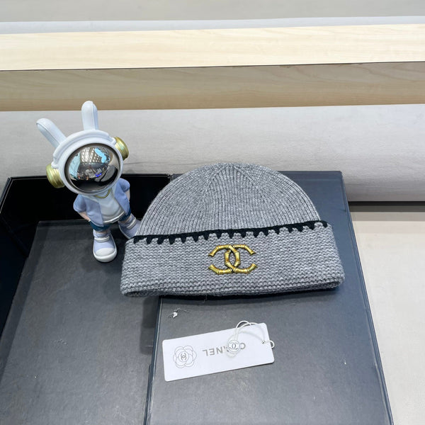 CAPPELLO IN MAGLIA DI LANA GRIGIO OMBRA 424301