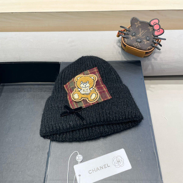 BERRETTO IN LANA NERA CON FIOCCO 421254 