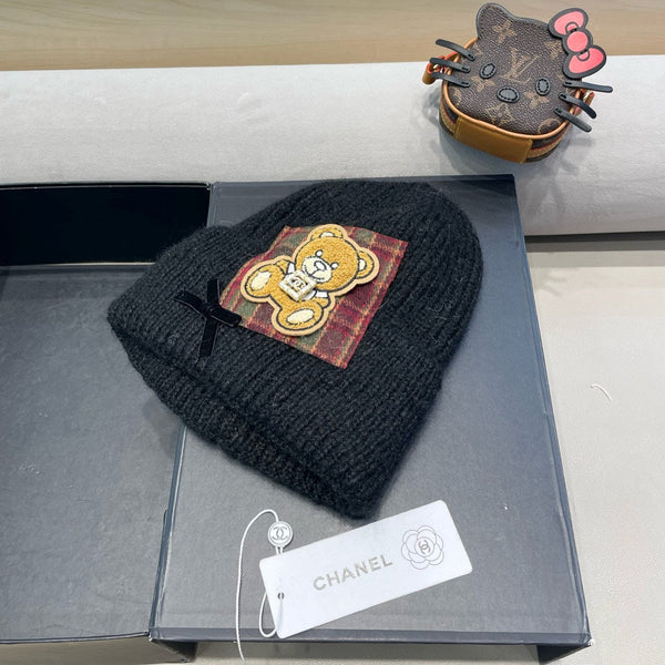 BERRETTO IN LANA NERA CON FIOCCO 421254 