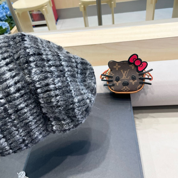 CAPPELLO A RIGHE IN MAGLIA DI LANA GRIGIO SCURO 424516 