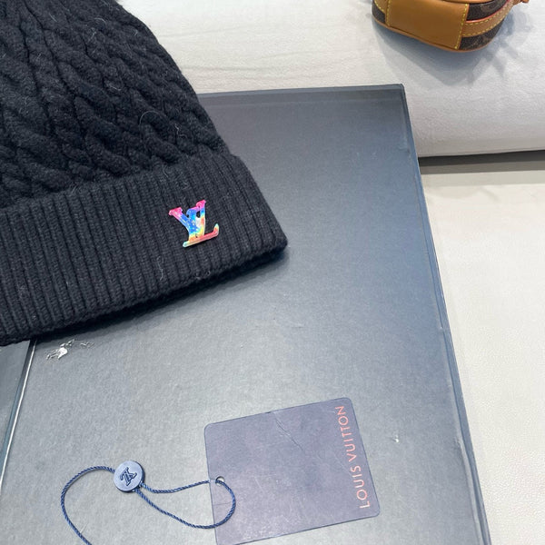 KNITTED BEANIE HAT IN BLACK WOOL 426217