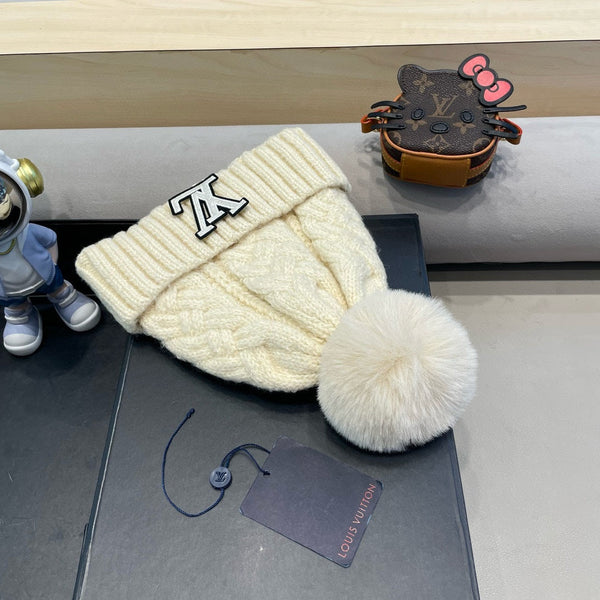 BERRETTO IN MAGLIA DI LANA BEIGE E PELLICCIA DI AGNELLO 430045