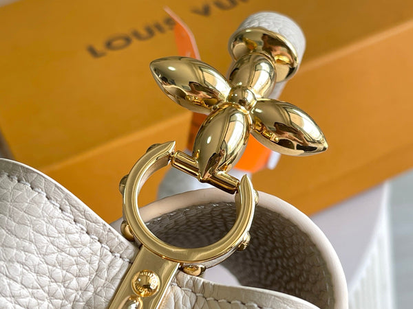 CAPUCINES BB 27 BEIGE TAURILLON GOLD HARDWARE