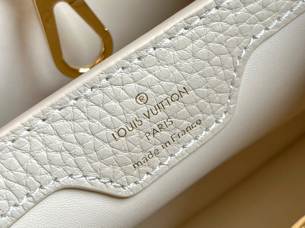 CAPUCINES MINI 21 BEIGE TAURILLON GOLD HARDWARE