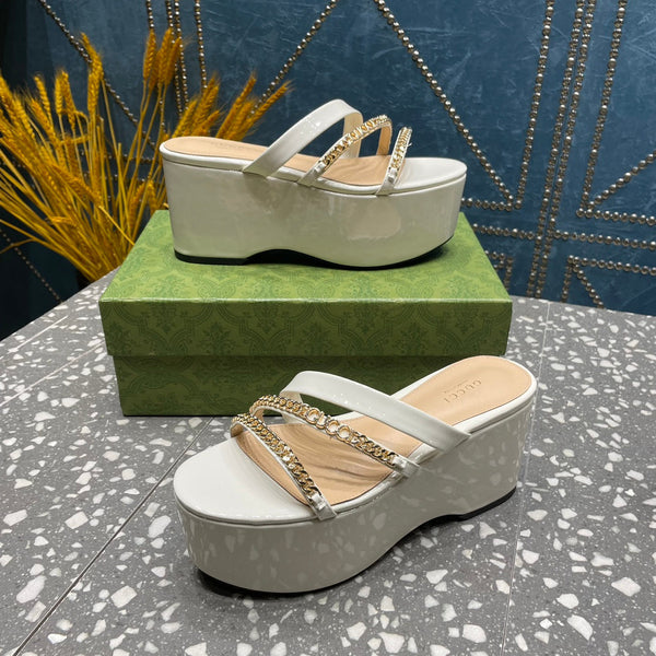 HIGH WEDGE PLATFORM IN WHITE CALFSKIN WITH GOLD HARDWARE