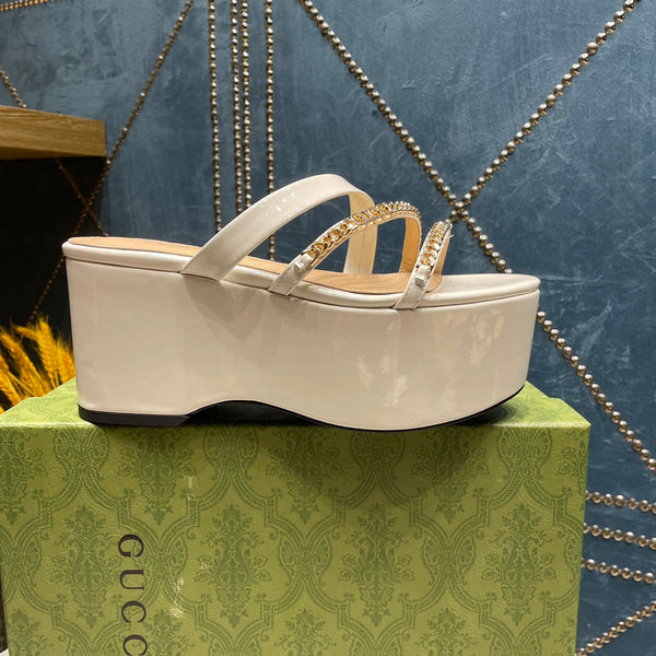 HIGH WEDGE PLATFORM IN WHITE CALFSKIN WITH GOLD HARDWARE