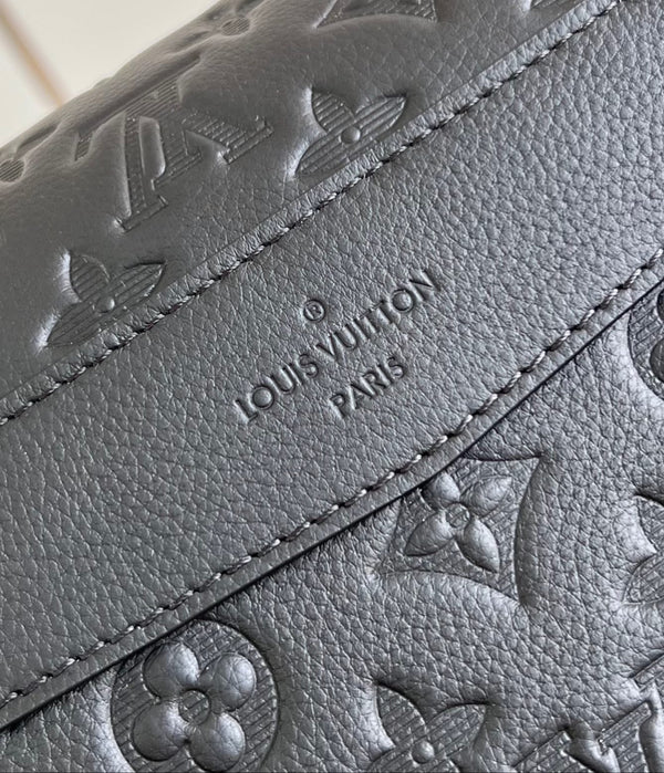 MESSENGER VOYAGER PM 33 IN BLACK MONOGRAM SHADOW CALFSKIN