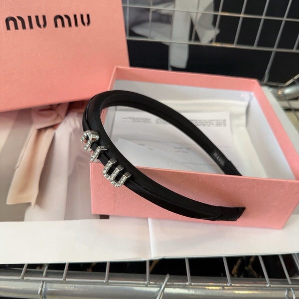 CERCHIETTO IN SETA CON LOGO IN CRISTALLO NERO 196475