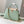 capucines bb 27 green beige taurillon leather gold hardware