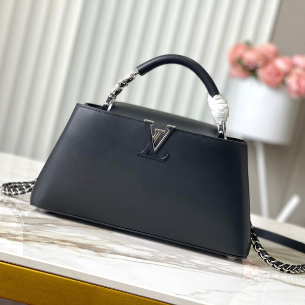 CAPUCINES EAST-WEST 30 IN PELLE DI MONTONE NERA CON CRISTALLI E FERRAMENTA IN ARGENTO