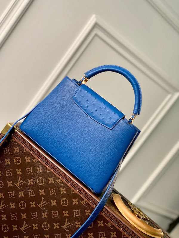 CAPUCINES BB 27 COBALT BLUE TAURILLON MOP GOLD HARDWARE