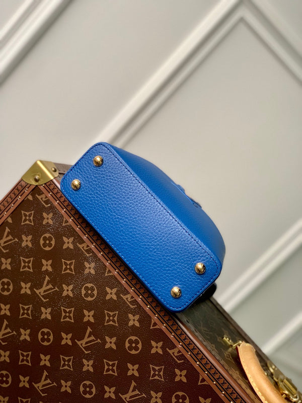 CAPUCINES MINI 21 COBALT BLUE TAURILLON GOLD HARDWARE