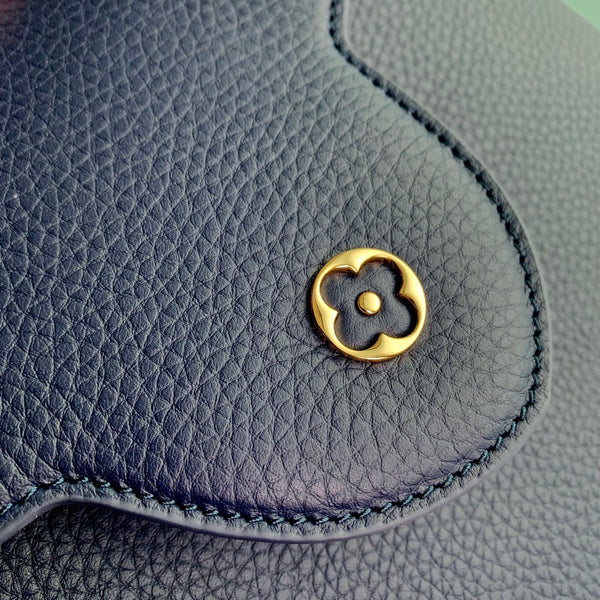 capucines mm 31.5 dark blue taurillon leather gold hardware