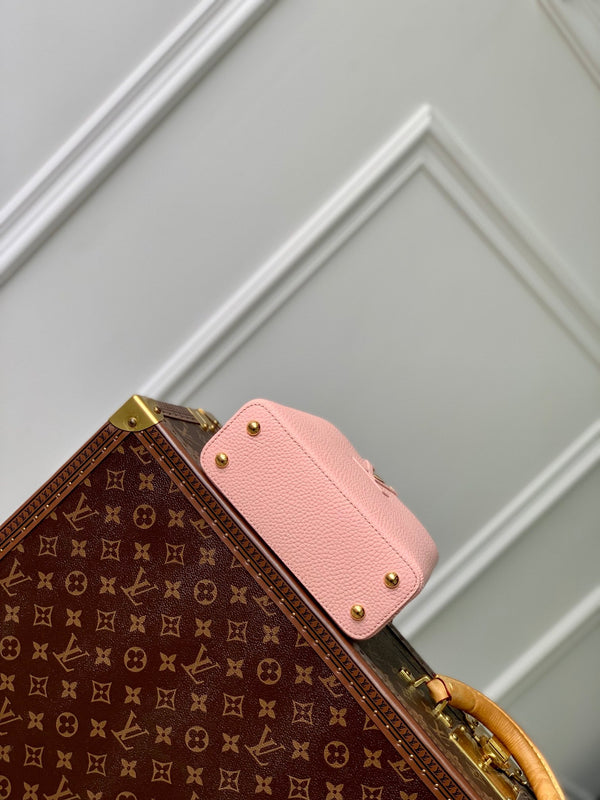 capucines mini 21 pink taurillon leather gold hardware