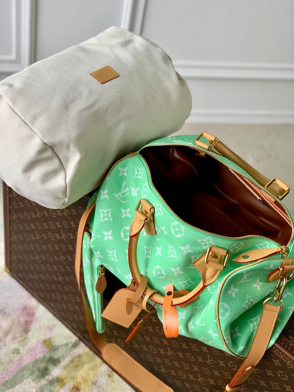 speedy p9 bandouliere 40cm green calfskin