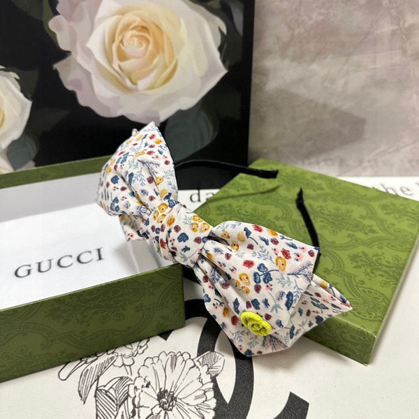 HAIRBAND IN WHITE FLORAL FABRIC 385855