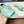 PRA SAFFIANO PATENT SLIDES OSTRICH MOTIF SEAFOAM CALFSKIN