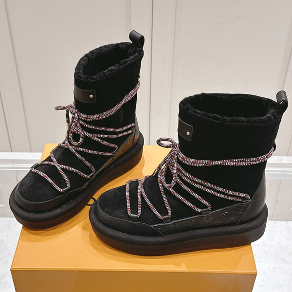 STIVALETTO CON PLATEAU ASPEN IN CAMOSCIO E SHEARLING CON MONOGRAMMA NERO