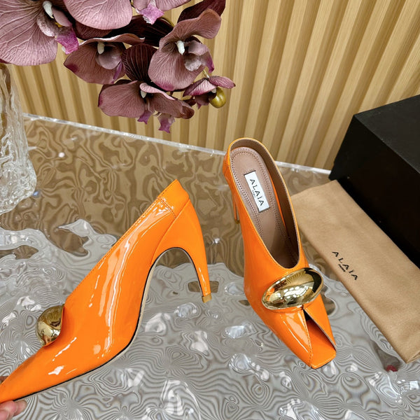 ALAIA AZZEDINE HIGH HEELS IN TANGERINE ORANGE CALFSKIN WITH GOLD HARDWARE