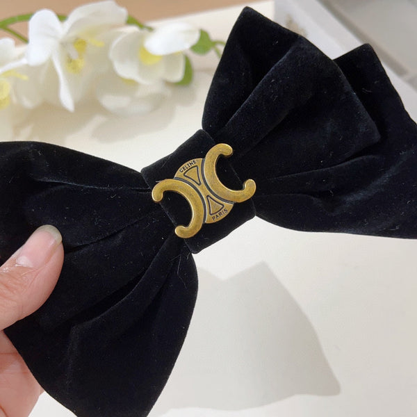 BLACK VELVET WITH GOLD LOGO HAIRPIN 387059