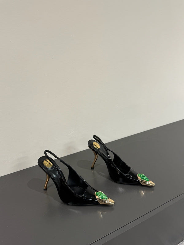 GREEN GEM-STUDDED SLINGBACK PUMPS IN BLACK PATENT CALFSKIN