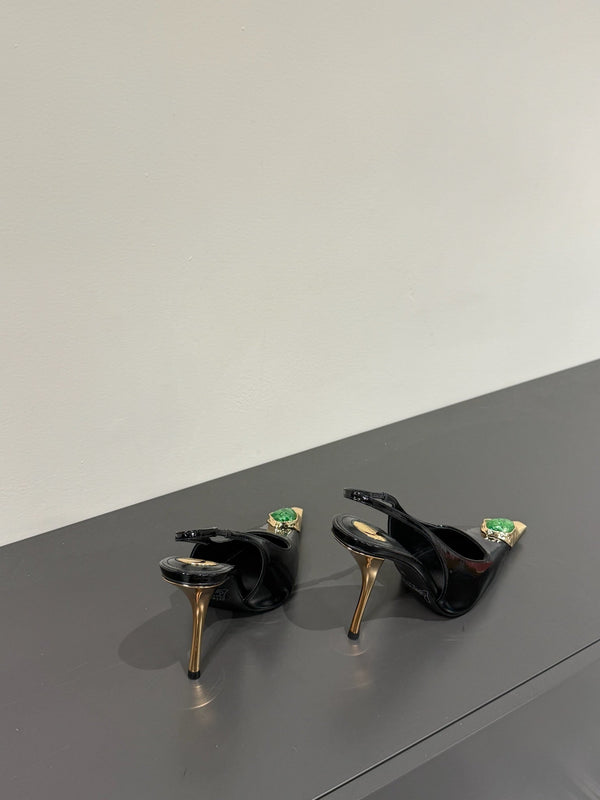 GREEN GEM-STUDDED SLINGBACK PUMPS IN BLACK PATENT CALFSKIN